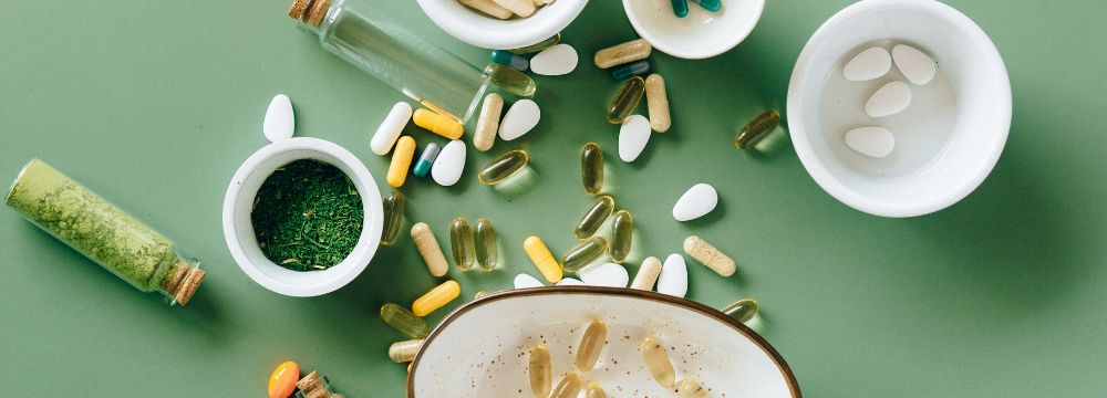 Supplements scattered on table
